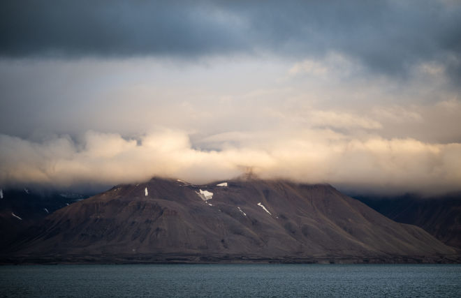 A picture shows a view of an island from a helicopter near the Svalbard archipelago, Norway