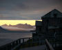 A wooden building is seen on a shore of Arctic Ocean in the settlement of Barentsburg on the Svalbard archipelago