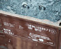 Containers with iron-free sulfide, a byproduct of steel production
