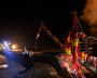 The Kirill Lavrov ice-class tanker during oil injection at the Prirazlomnaya offshore oil platform