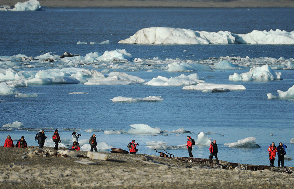 Russian Arctic National Park staff study artifacts of a German weather station