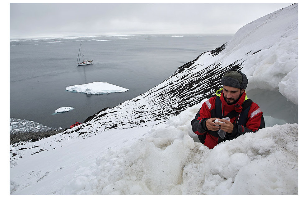 Zoologist Miroslav Babushkin explores Eurasia’s northernmost bear den on the slope of Cape Fligely