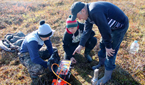 Schoolchildren, scientists measure permafrost thaw depth in Yamal-Nenets Autonomous Area