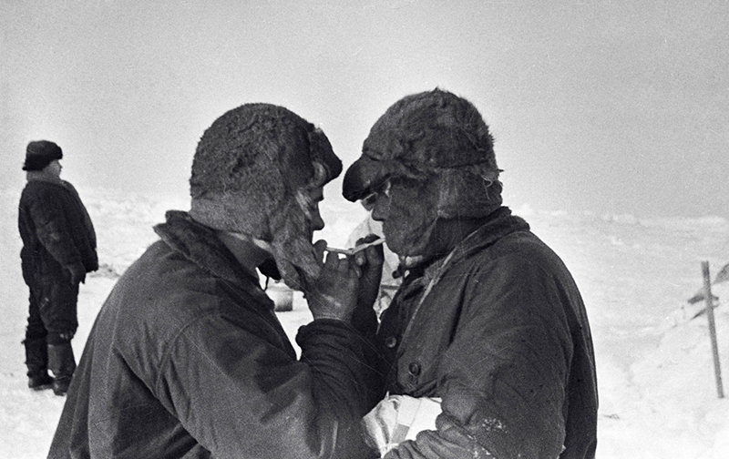 Ernst Krenkel (left) and Peter Shirshov (right) smoking on the ice floe after having spent there so many anxious days and nights