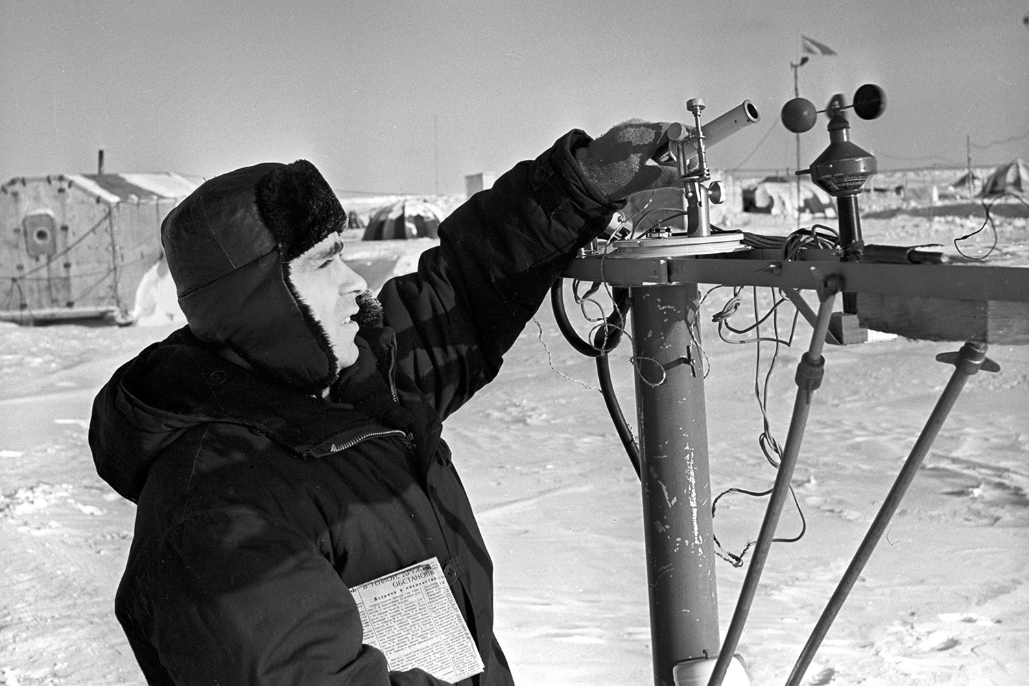 Meteorologist-aktinometrist Nikolai S. Makarov taking readings at the drifting ice station North Pole-12