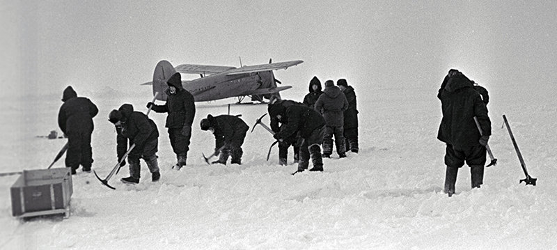 Arctic explorers repair a landing strip at the drifting station North Pole 12