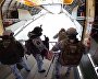 Russian paratroopers perform a group jump from an Ilyushin Il-76 aircraft from 10,000 m of altitude, using parachute systems in the extreme Arctic conditions near the Franz Josef Land Archipelago