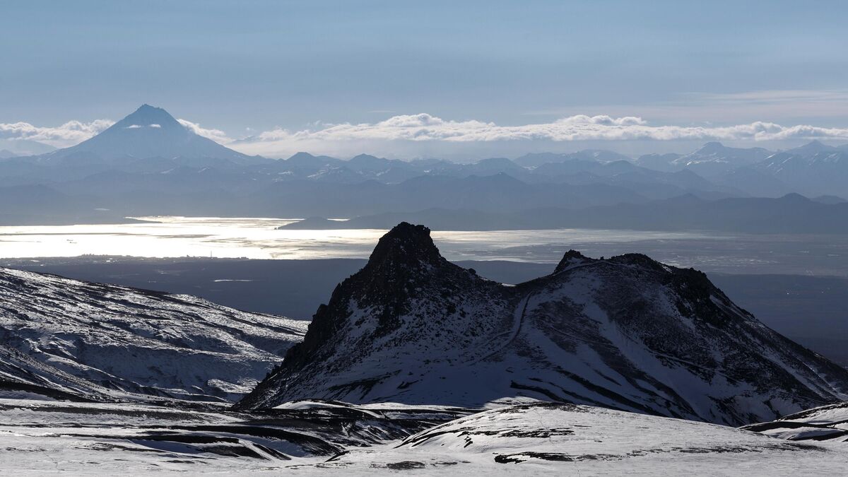 Foreground: Camel Cliff at Avacha Pass. Background: Avacha Bay and Vilyuchinsky Volcano 