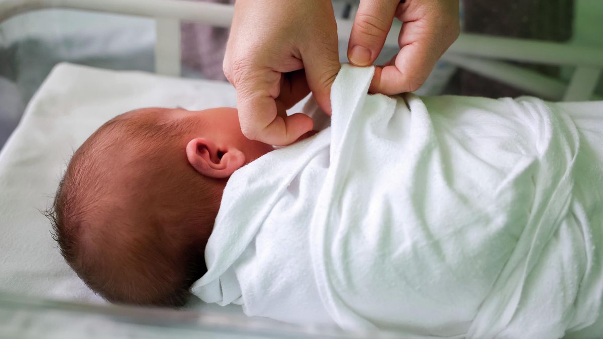 A newborn baby in a maternity hospital