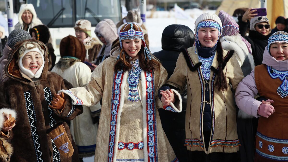 Women in traditional attire of the peoples of the North