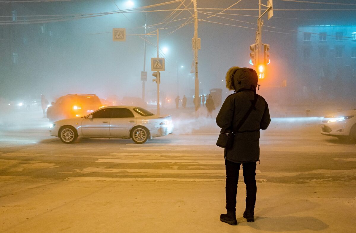A local resident on a street in Yakutsk