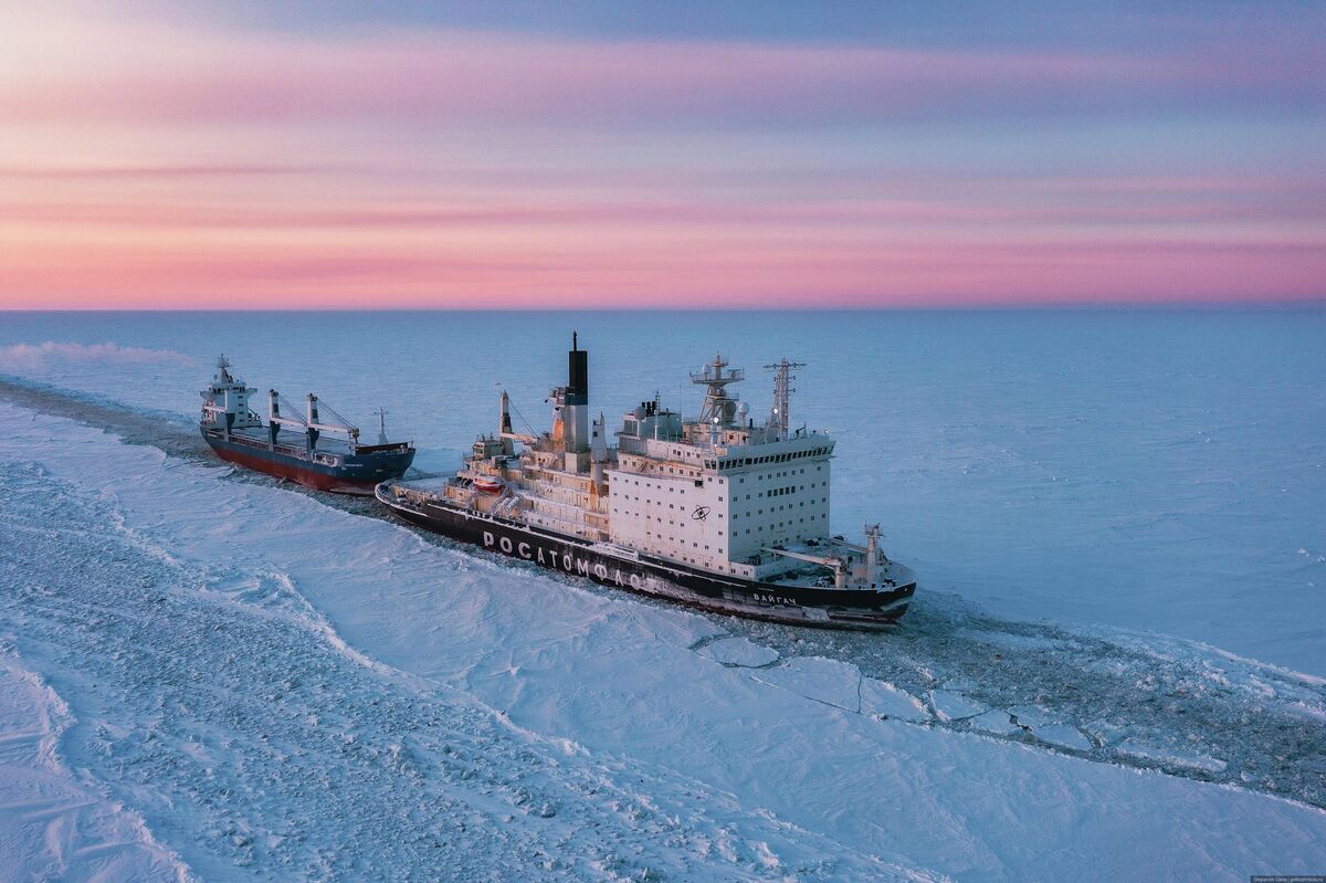 Nuclear-powered icebreaker Vaygach guiding a vessel through the ice