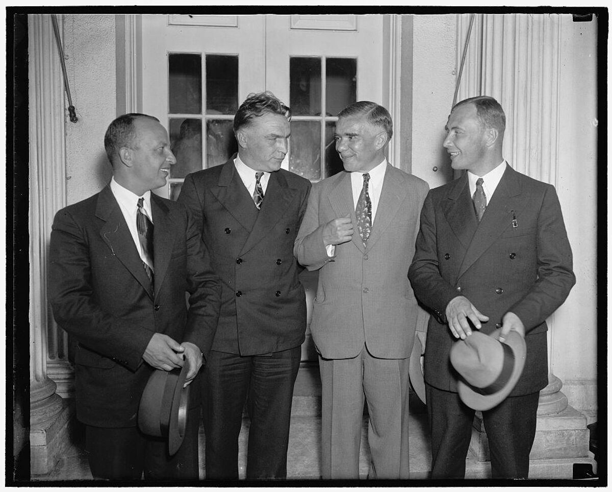Valery Chkalov, Georgy Baidukov, and Alexander Belyakov leaving the White House after reception by President Franklin D. Roosevelt