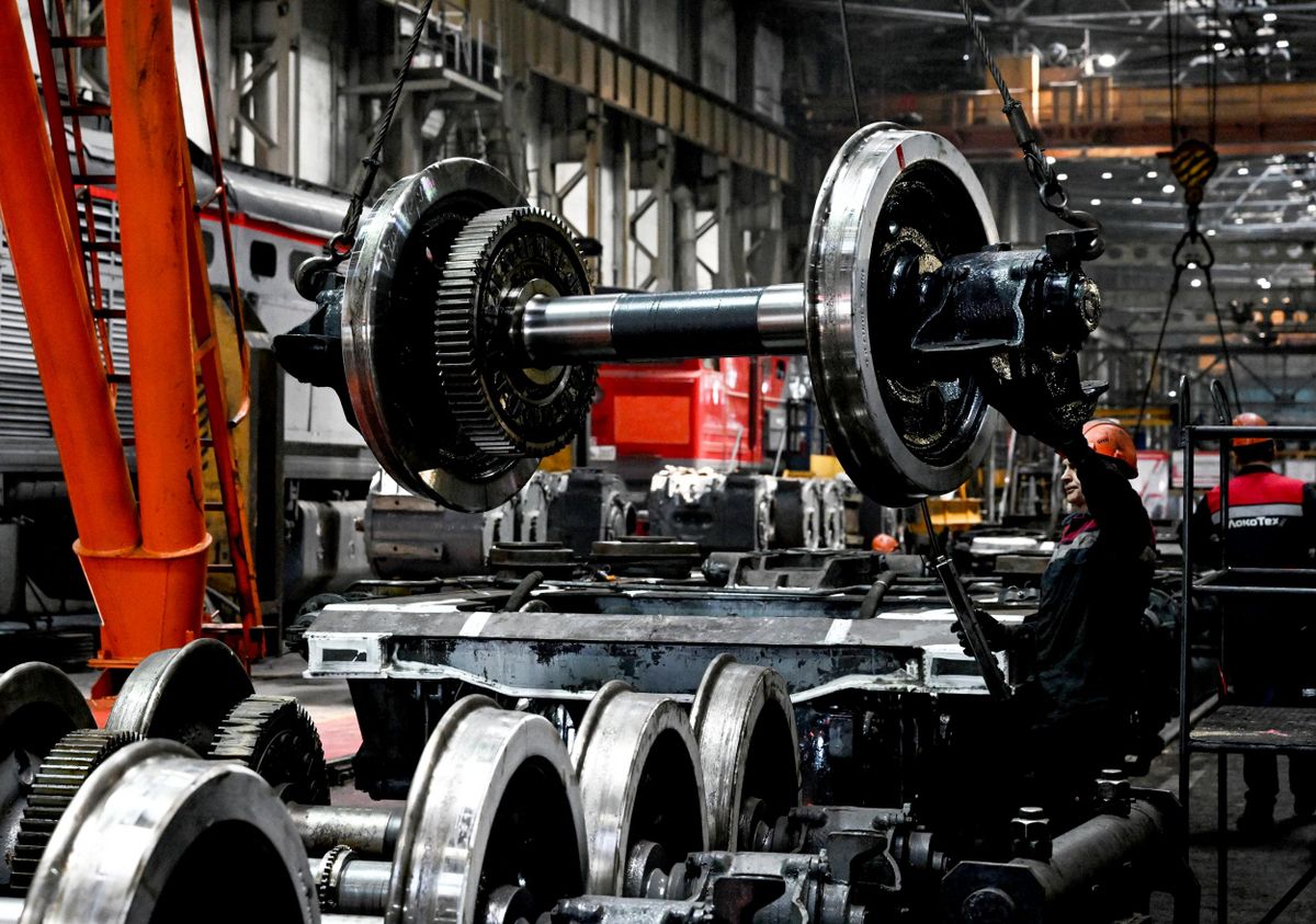 A worker in a shop of a locomotive maintenance facility in Tynda A worker in a shop of a locomotive maintenance facility in Tynda