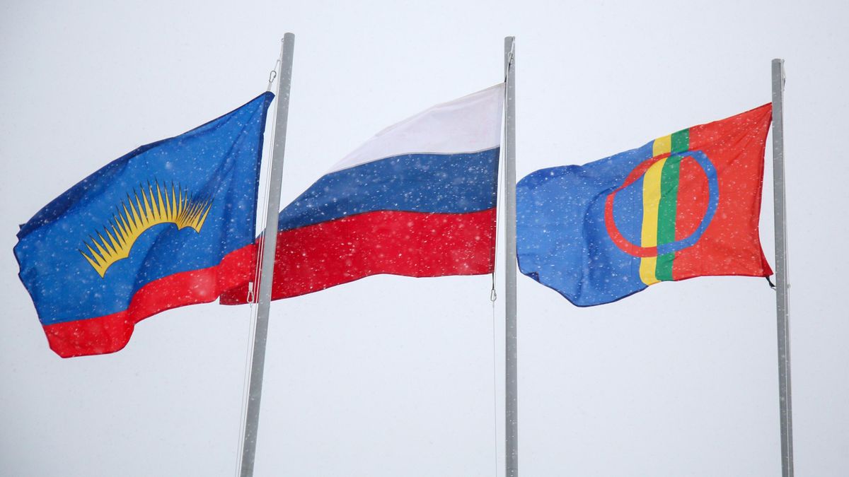 Flags of the Murmansk Region, the Russian Federation, and the Sámi national flag, raised in honor of International Sámi Day Flags of the Murmansk Region, the Russian Federation, and the Sámi national flag, raised in honor of International Sámi Day