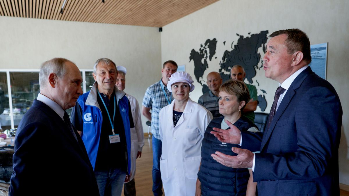 Vladimir Putin touring the Yasny fish processing complex on Iturup Island