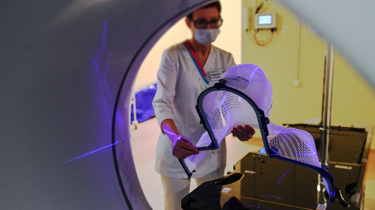 Doctor at a radiation therapy device